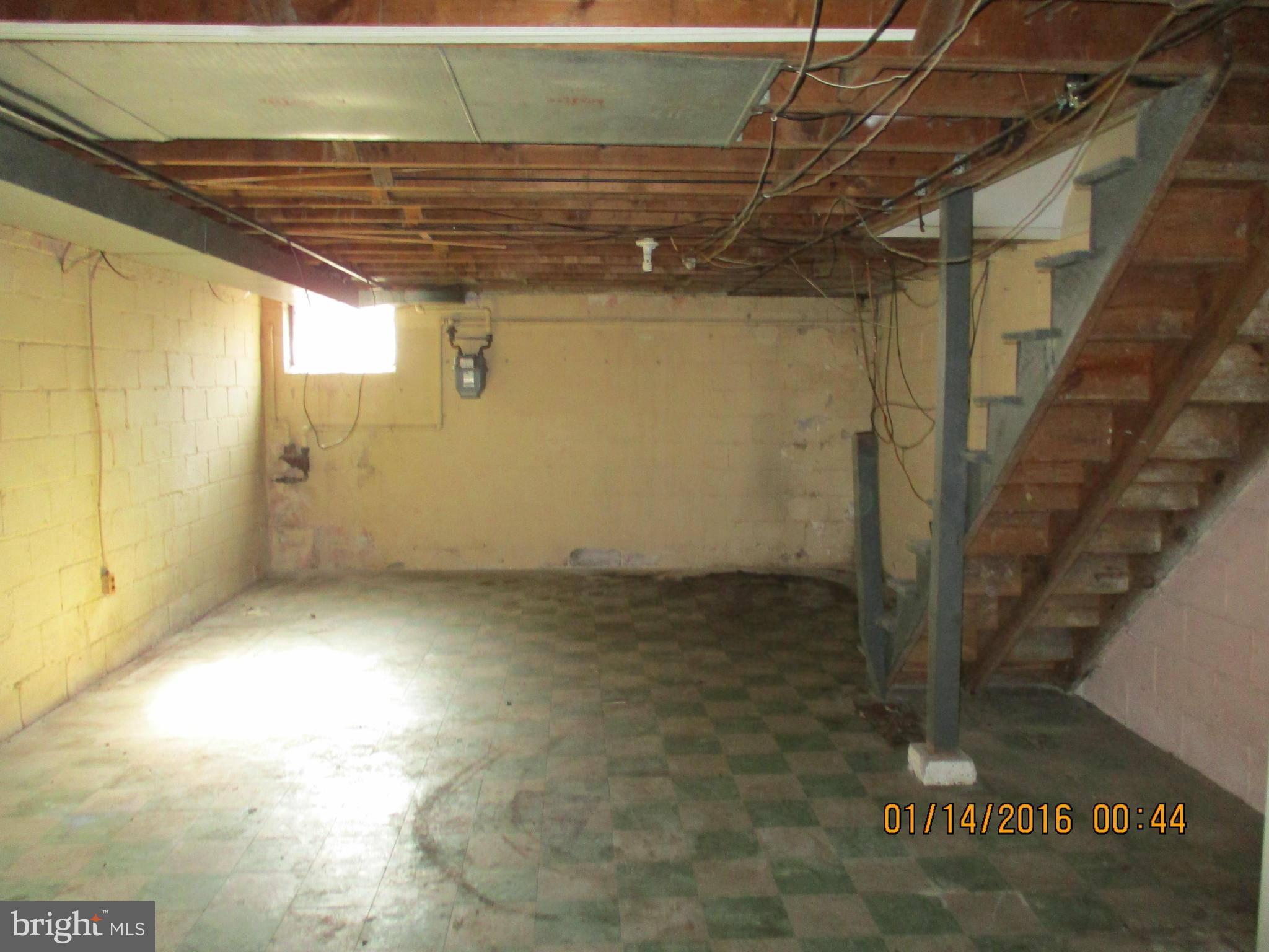 2706 Norfen Road Baltimore, MD 21227 - Photo 8 of 10 a view of a room with racks on the wall