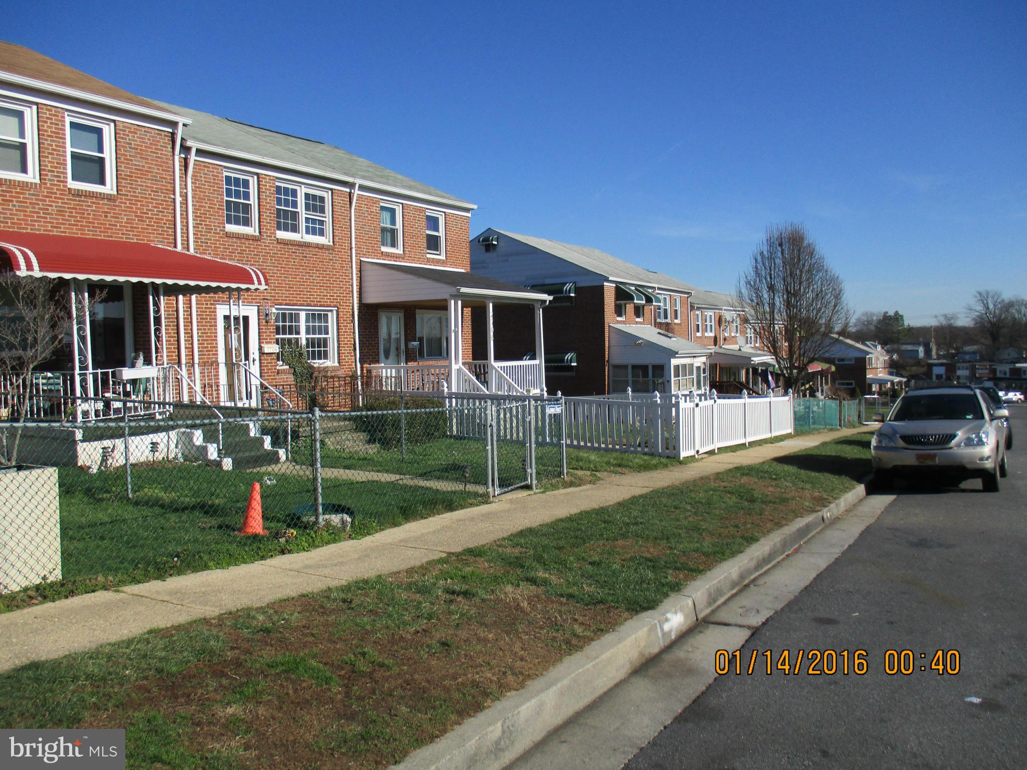 2706 Norfen Road Baltimore, MD 21227 - Photo 10 of 10 a front view of a house with a yard