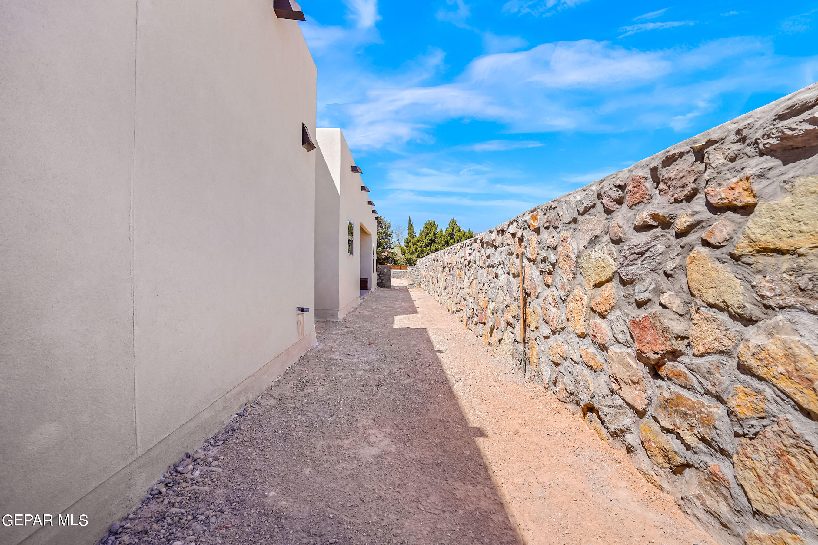 871 Country Club Road, Unit 4E El Paso, TX 79932 - Photo 32 of 34 a view of a pathway with a yard