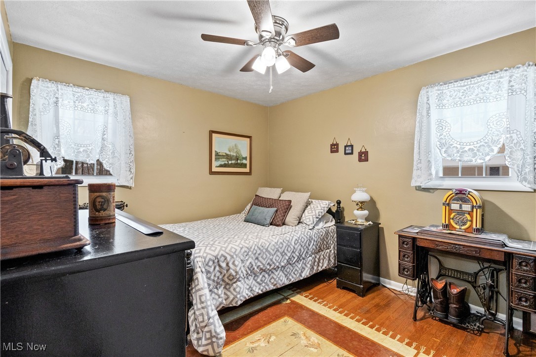 3589 Center Road Perry, OH 44081 - Photo 16 of 31 Bedroom with hardwood / wood-style flooring and ceiling fan