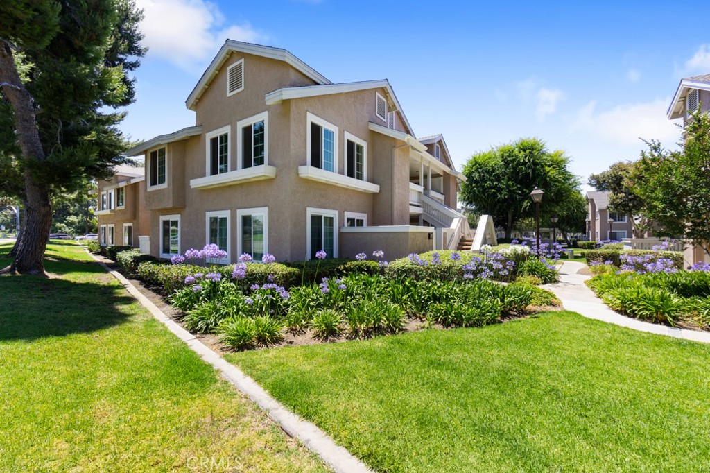 115 Greenfield Irvine, CA 92614 - Photo 1 of 1 a front view of a house with a yard