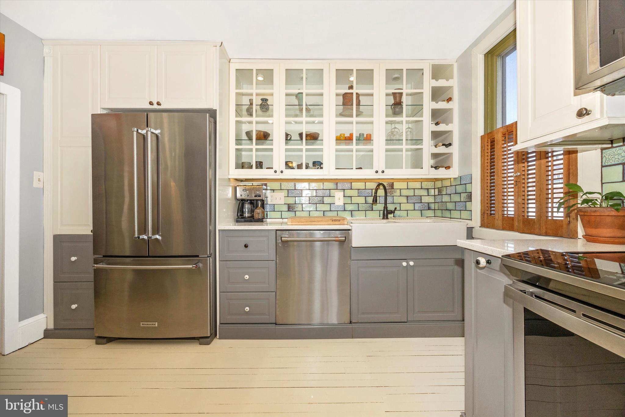 73 West Main Street New Market, MD 21774 - Photo 16 of 44 a kitchen with stainless steel appliances granite countertop a refrigerator and a stove