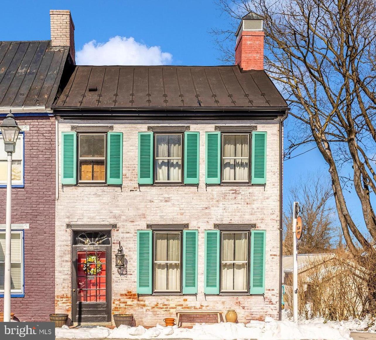73 West Main Street New Market, MD 21774 - Photo 2 of 44 a front view of a house with glass windows