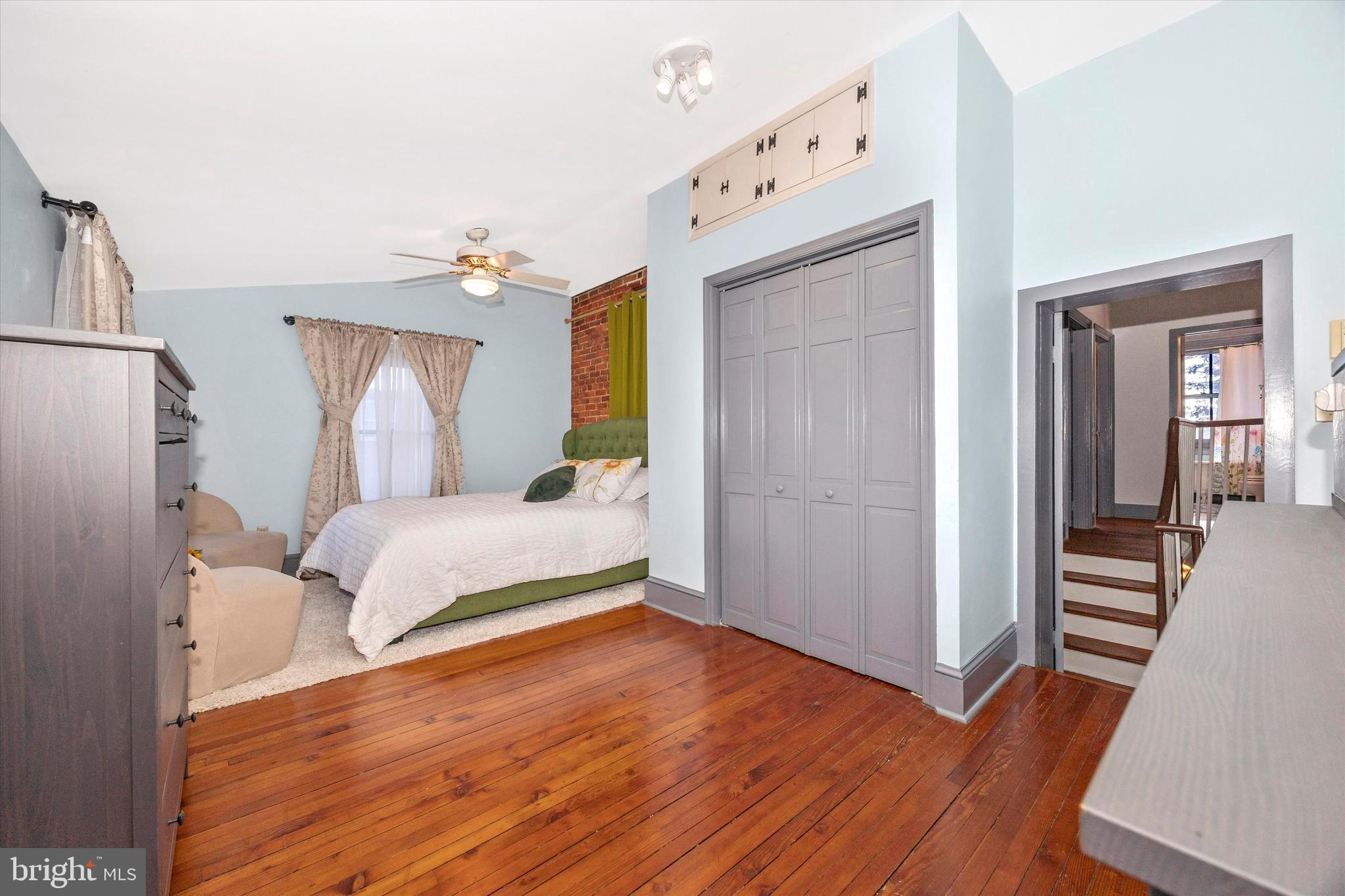 73 West Main Street New Market, MD 21774 - Photo 24 of 44 a bedroom with wooden floor
