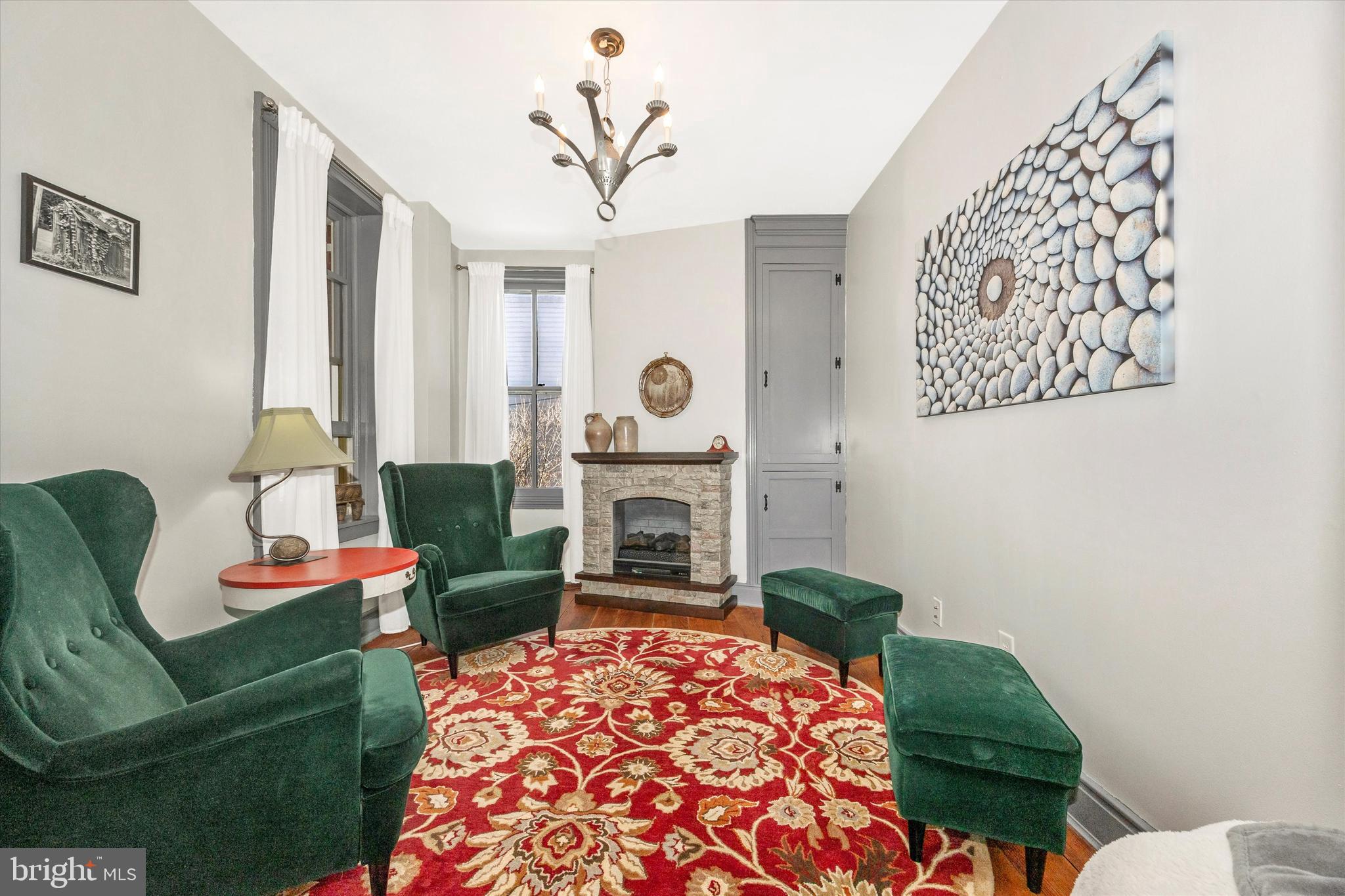 73 West Main Street New Market, MD 21774 - Photo 10 of 44 a living room with furniture and a fireplace