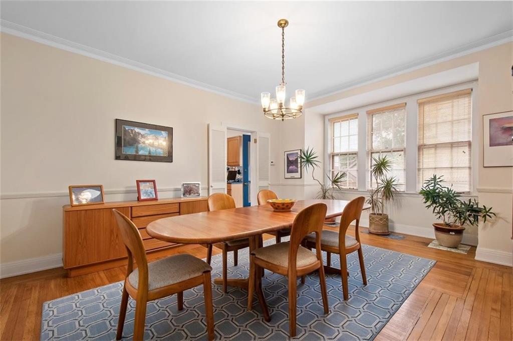 5624 Marlborough Road Pittsburgh, PA 15217 - Photo 11 of 25 a view of a dining room with furniture window and wooden floor