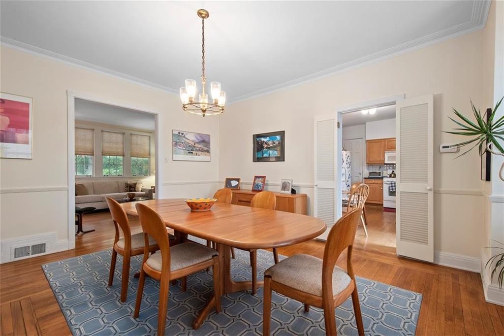 5624 Marlborough Road Pittsburgh, PA 15217 - Photo 12 of 25 a view of a dining room with furniture window and wooden floor