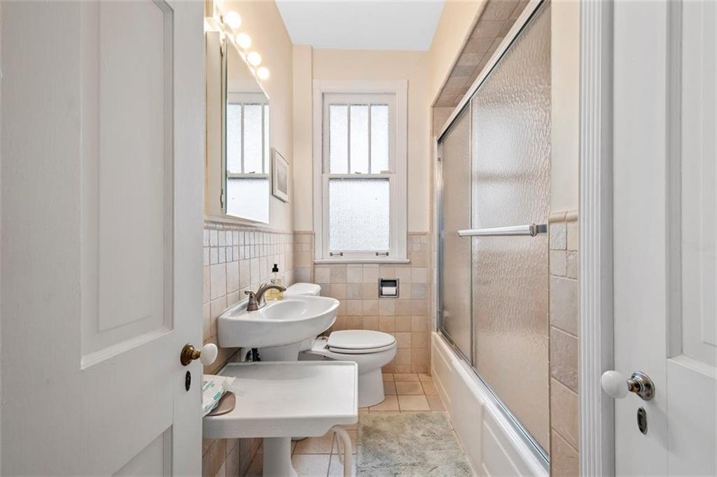 5624 Marlborough Road Pittsburgh, PA 15217 - Photo 20 of 25 a bathroom with a sink toilet and shower