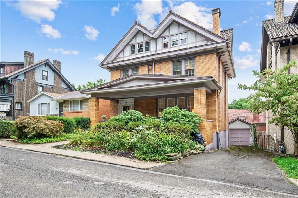 5624 Marlborough Road Pittsburgh, PA 15217 - Photo 2 of 25 front view of a house with a small yard
