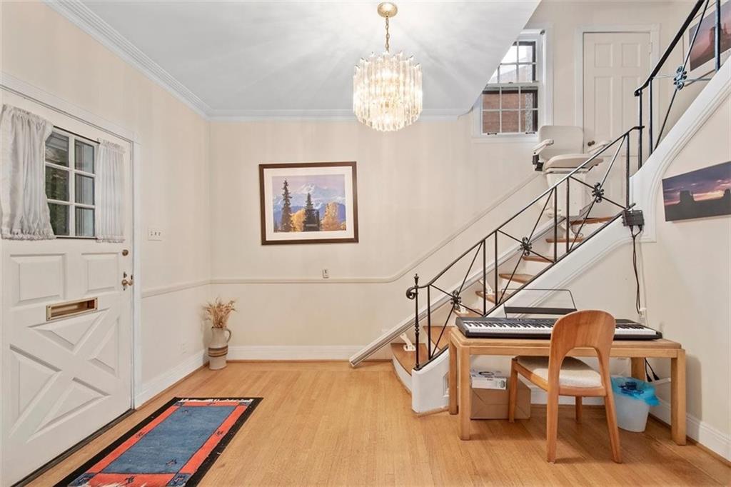 5624 Marlborough Road Pittsburgh, PA 15217 - Photo 7 of 25 a view of a room with wooden floor and windows