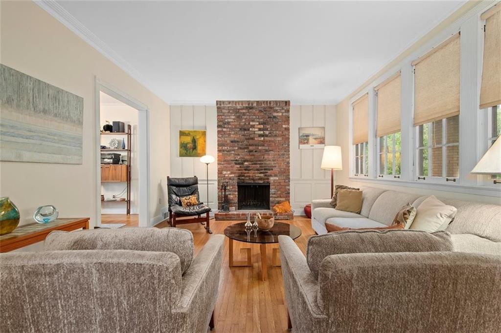 5624 Marlborough Road Pittsburgh, PA 15217 - Photo 8 of 25 a living room with furniture and a fireplace