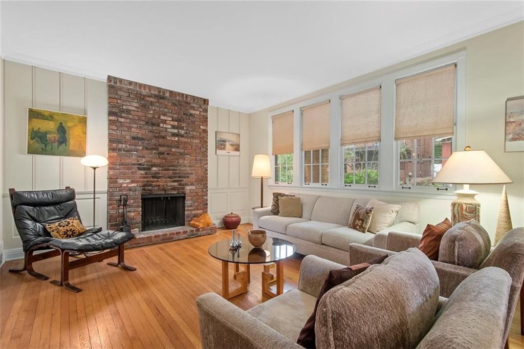 5624 Marlborough Road Pittsburgh, PA 15217 - Photo 9 of 25 a living room with furniture and a fireplace