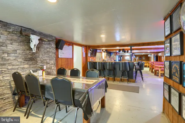 a view of a dining room with furniture