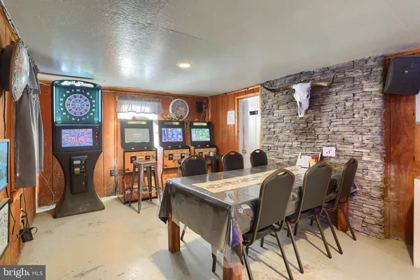 a view of a room with lots of furniture
