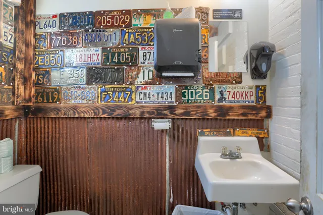 a view of a dining room with furniture and a livingroom