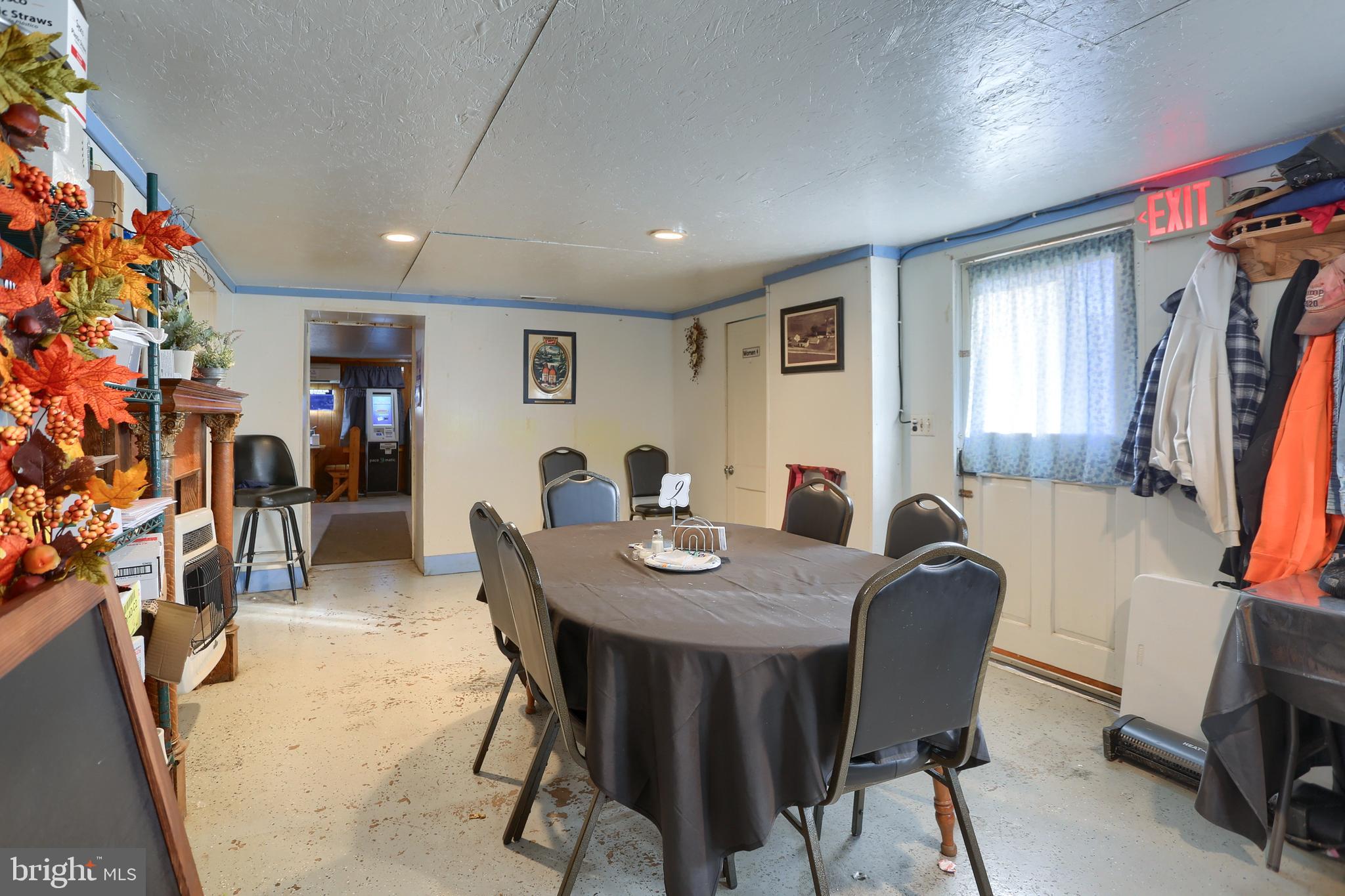 3095 Turkey Valley Road Mount Pleasant Mills, PA 17853 - Photo 21 of 55 a view of a dining room with furniture and a livingroom