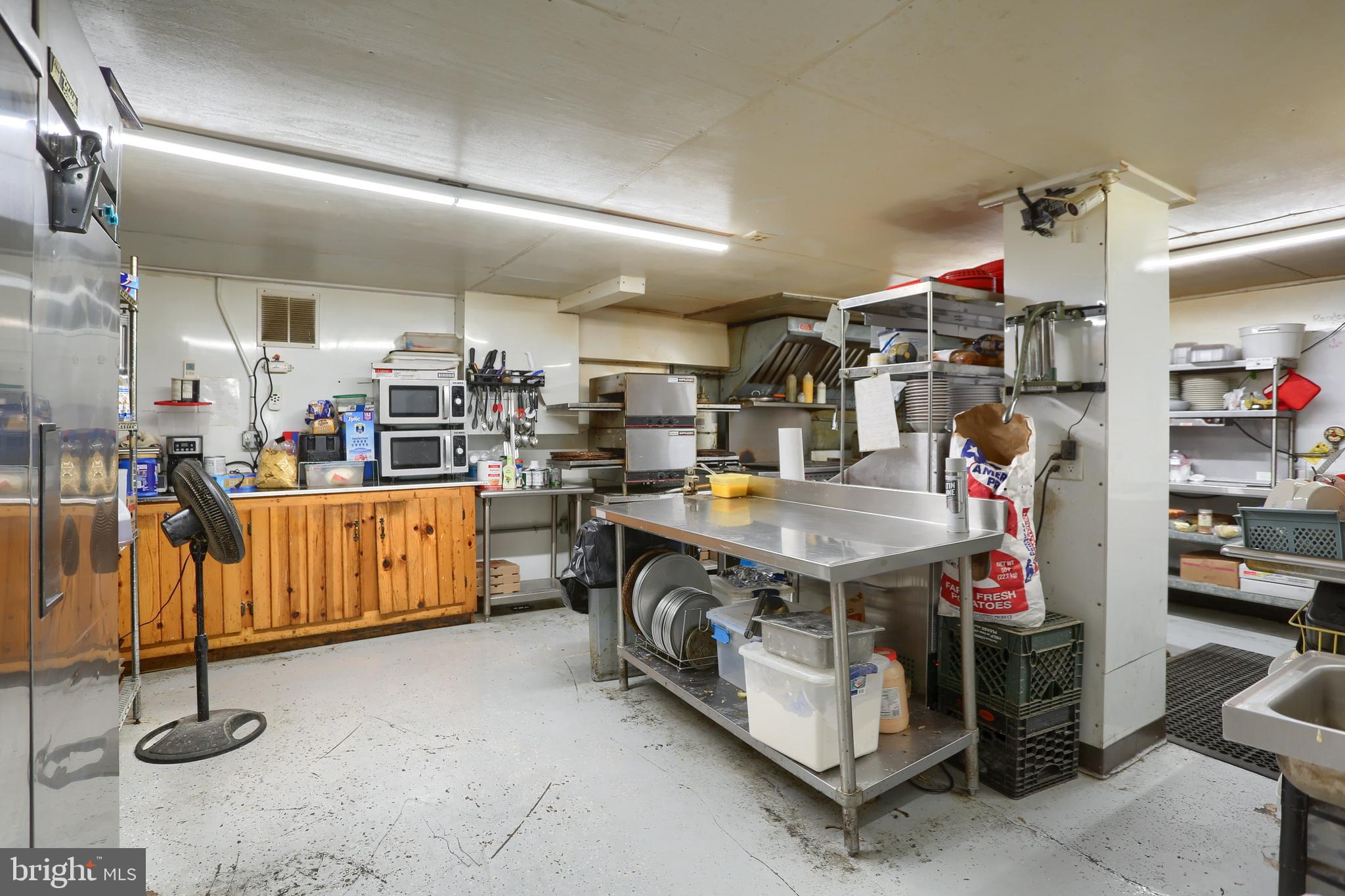 3095 Turkey Valley Road Mount Pleasant Mills, PA 17853 - Photo 25 of 55 a utility room with lots of wooden furniture