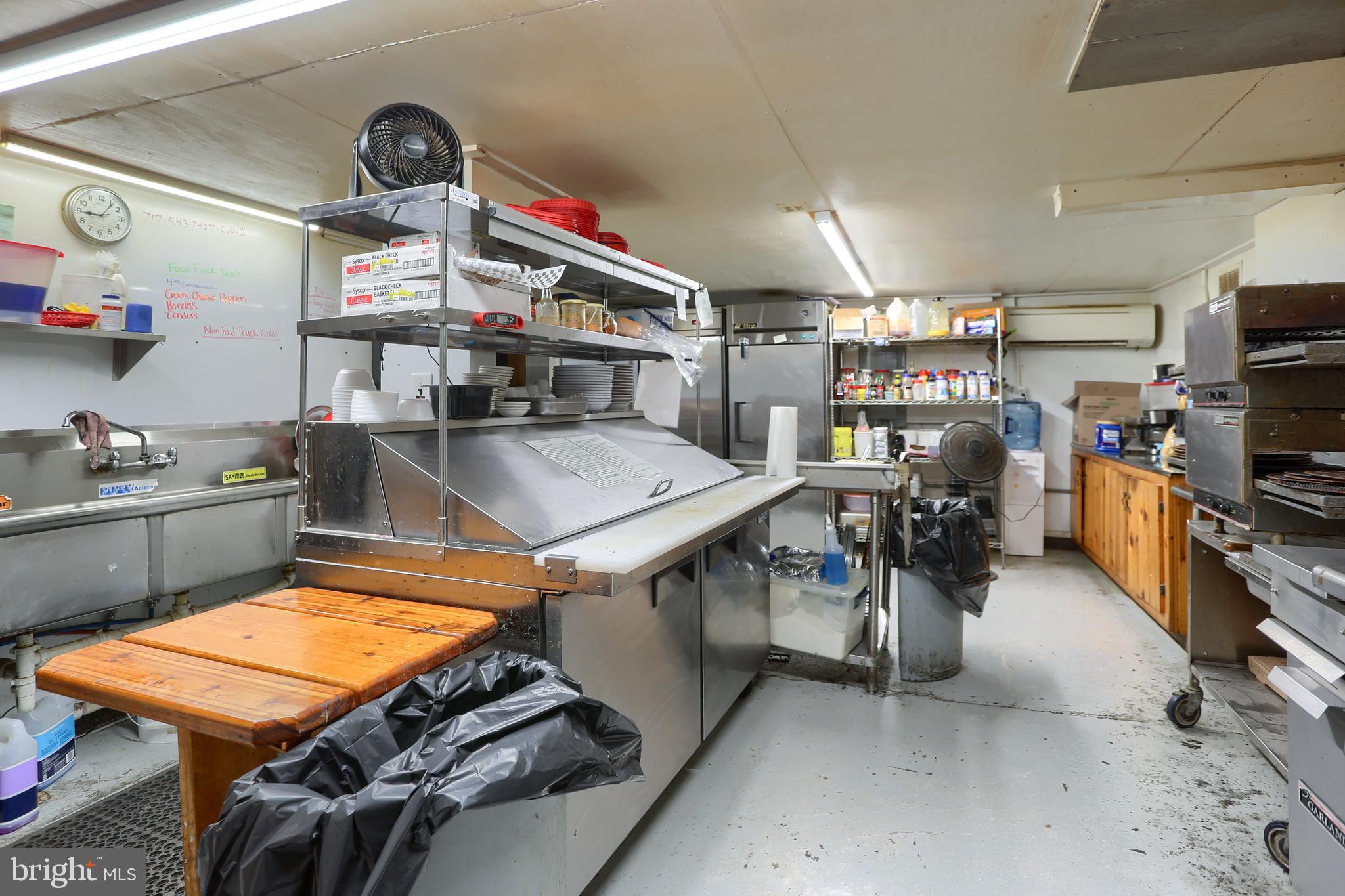 3095 Turkey Valley Road Mount Pleasant Mills, PA 17853 - Photo 26 of 55 a storage room with washer and dryer