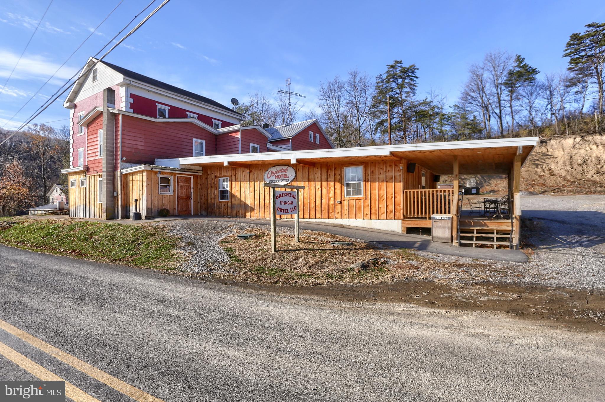 3095 Turkey Valley Road Mount Pleasant Mills, PA 17853 - Photo 3 of 55 front view of a house with a street