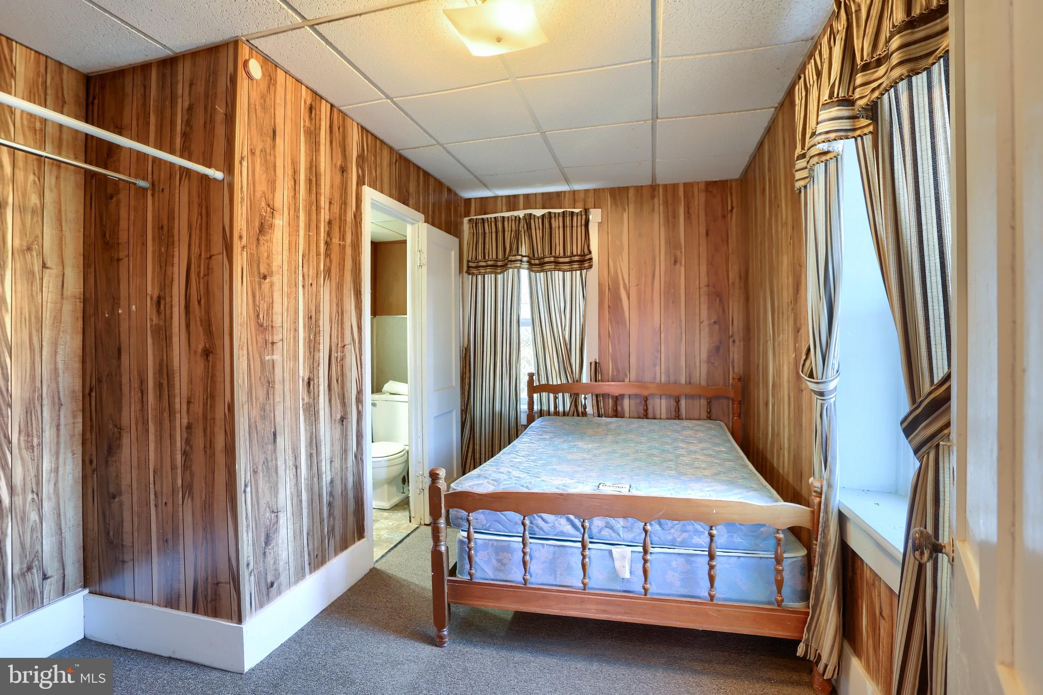 3095 Turkey Valley Road Mount Pleasant Mills, PA 17853 - Photo 35 of 55 a bedroom with a bed and a window