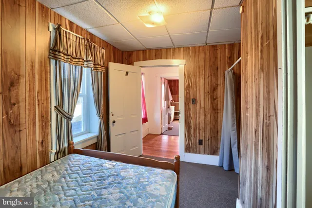 a room with window and wooden floor