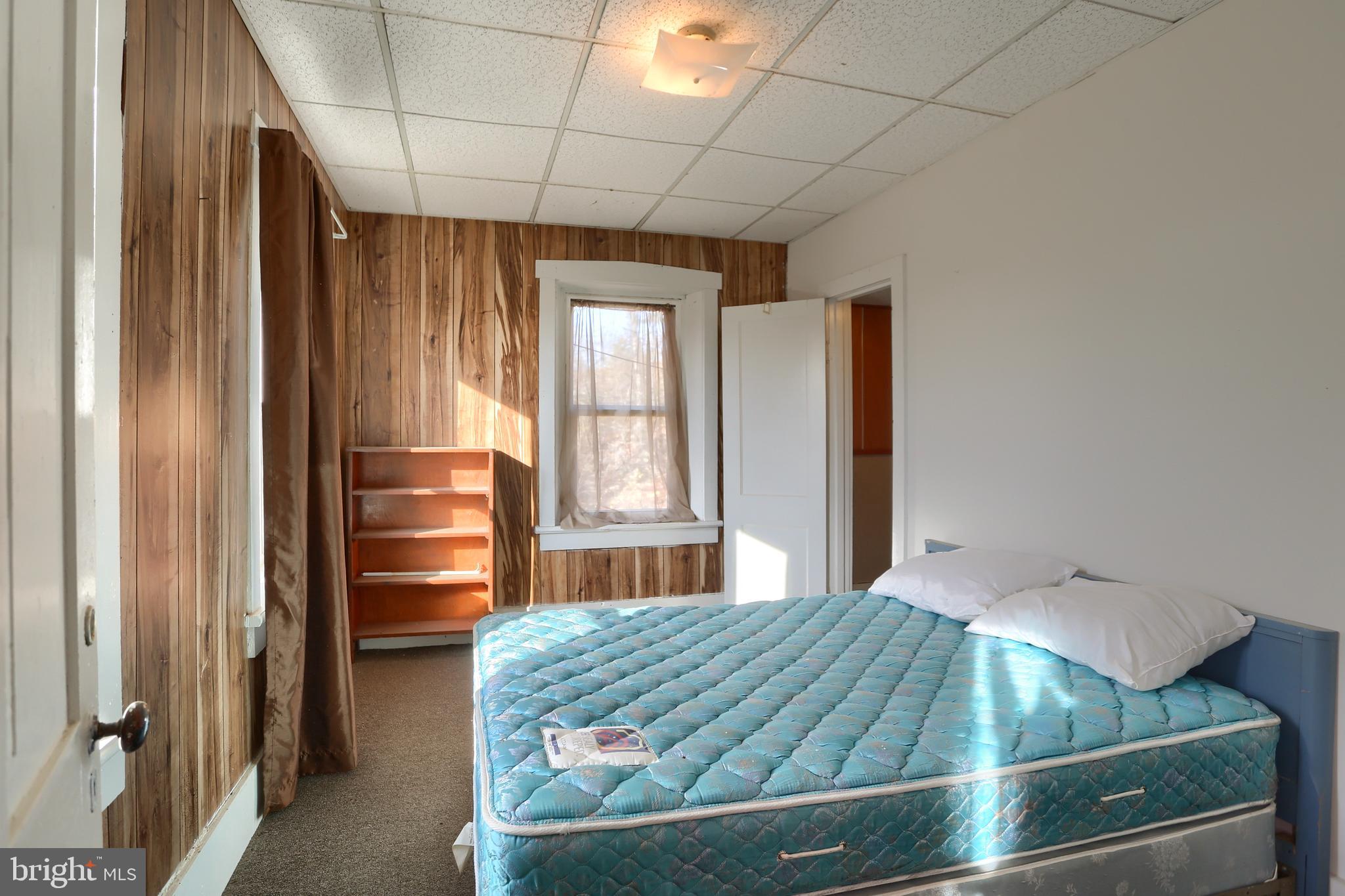 3095 Turkey Valley Road Mount Pleasant Mills, PA 17853 - Photo 39 of 55 a room with window and wooden floor