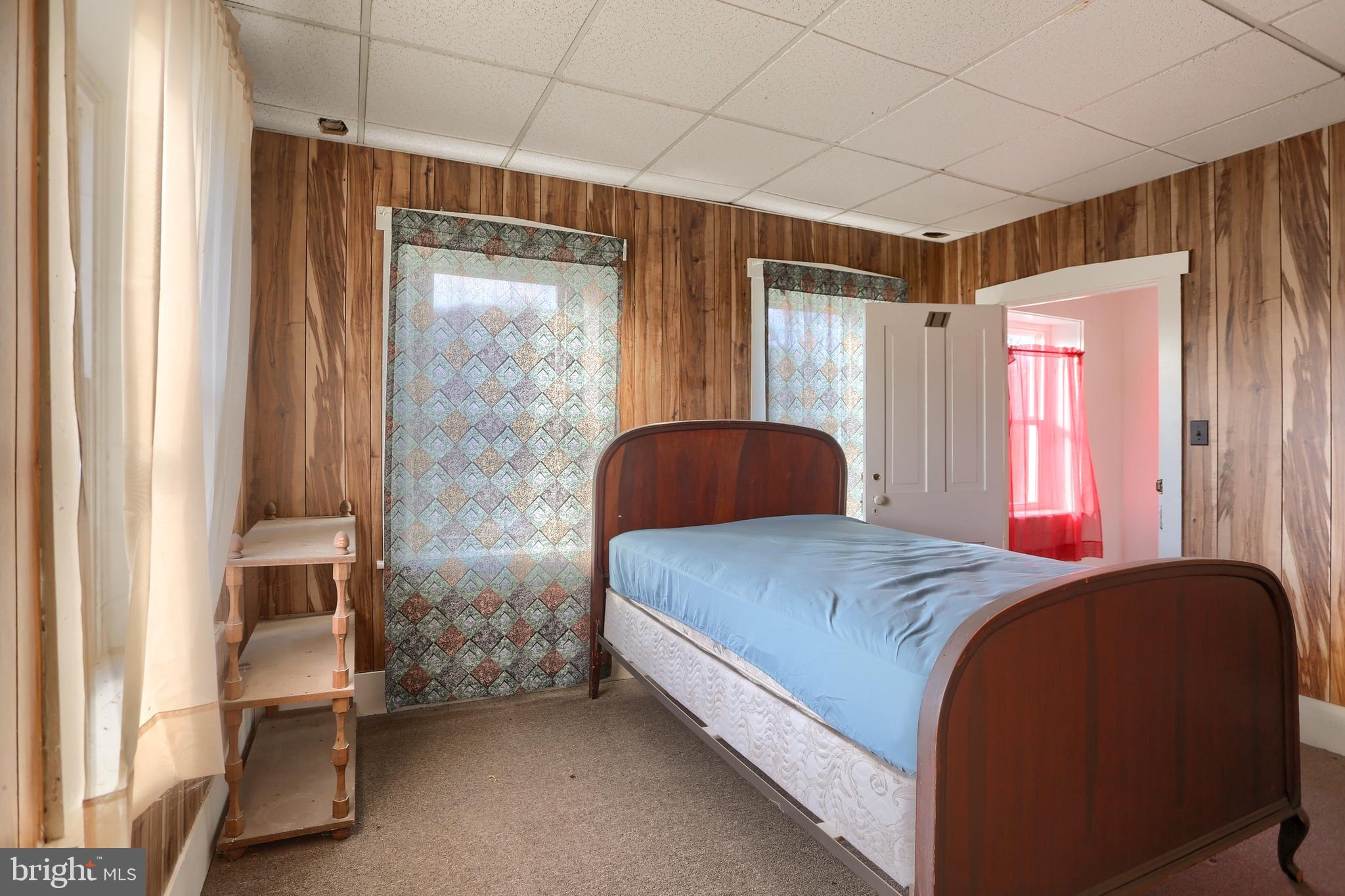 3095 Turkey Valley Road Mount Pleasant Mills, PA 17853 - Photo 44 of 55 a bedroom with a bed and a window