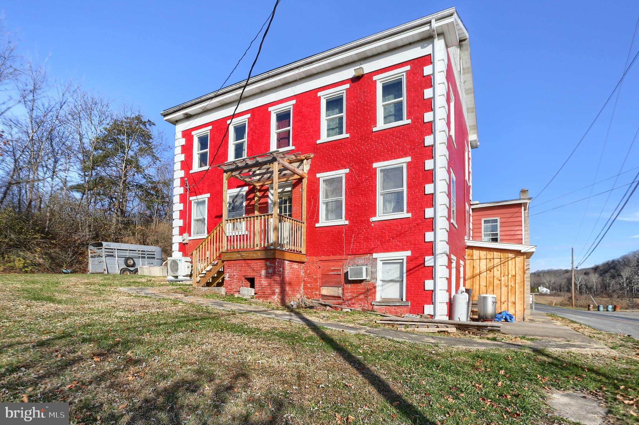 3095 Turkey Valley Road Mount Pleasant Mills, PA 17853 - Photo 7 of 55 a view of a building with many windows