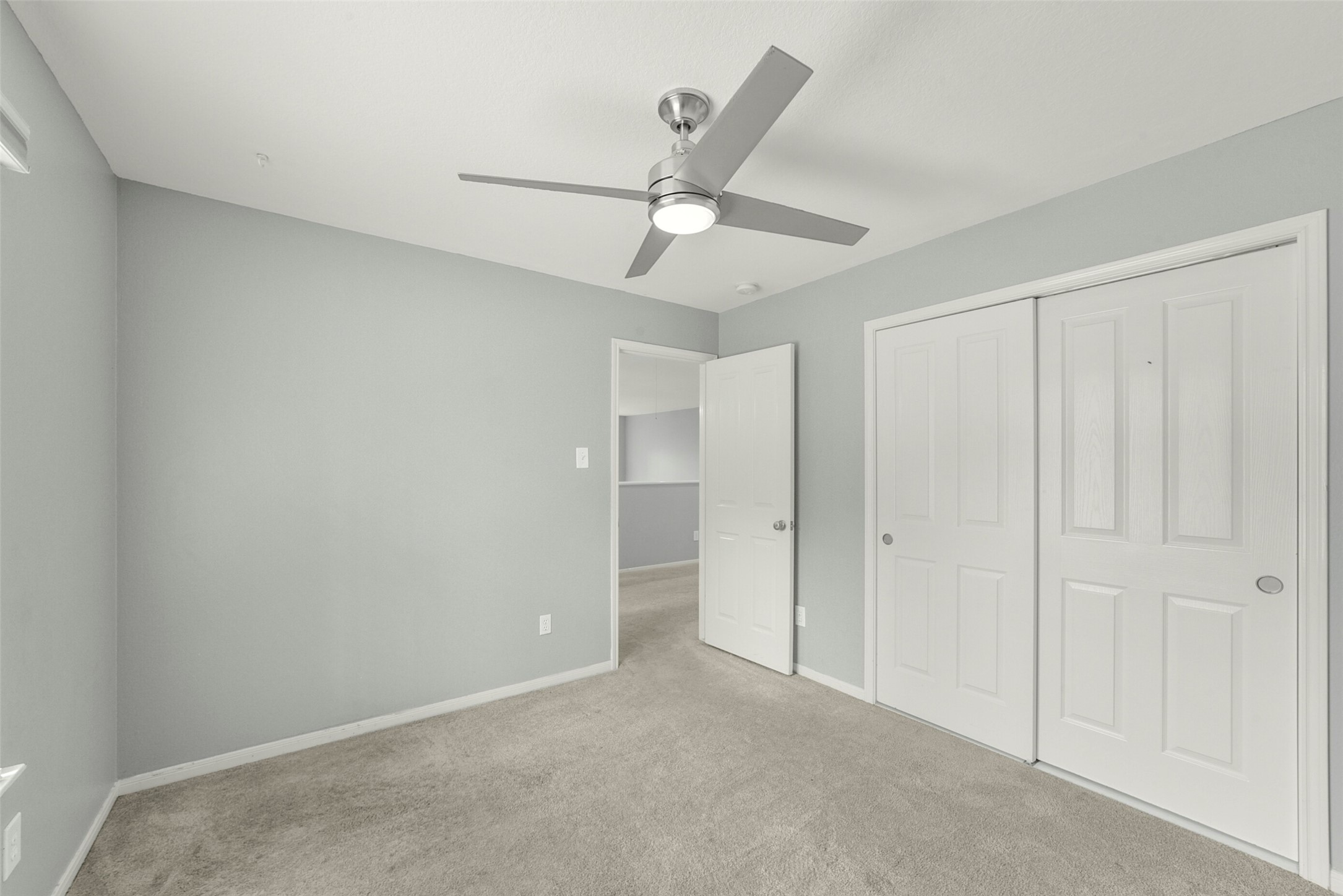 22 East New Avery Place Spring, TX 77382 - Photo 39 of 46 Third bedroom with sliding door clause upstairs.