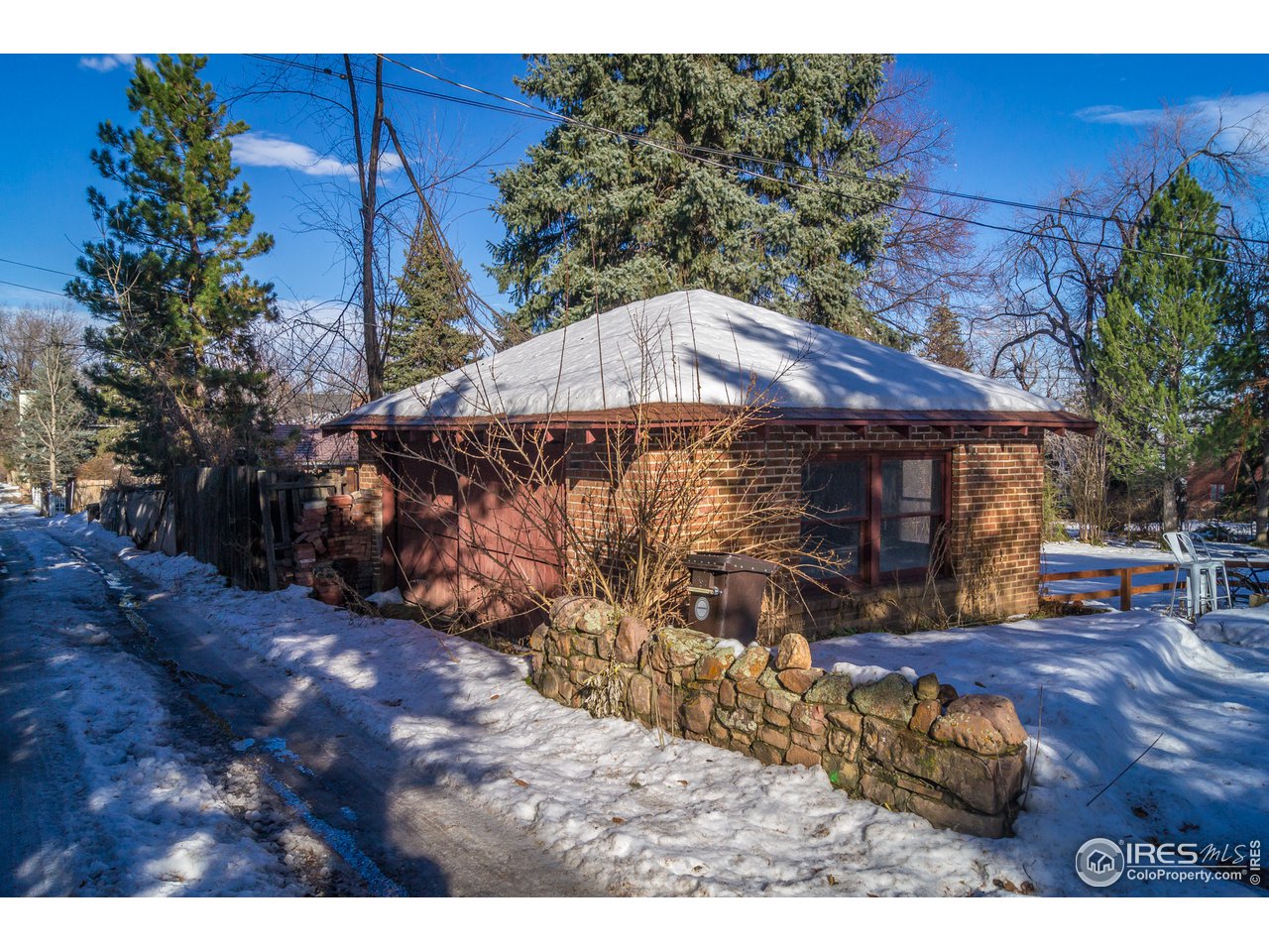 757 12th Street Boulder, CO 80302 - Photo 5 of 7 a view of a backyard with large tree