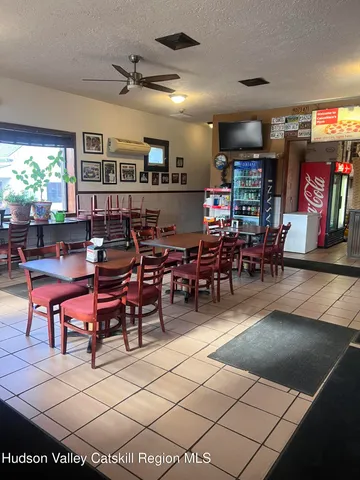 a view of a dining room with furniture