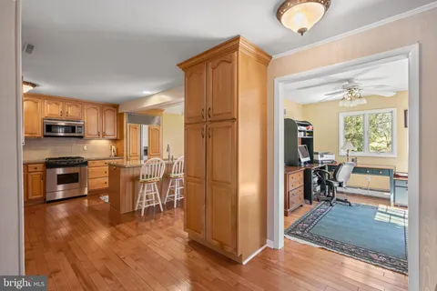 a view of a dining area with furniture window and wooden floor