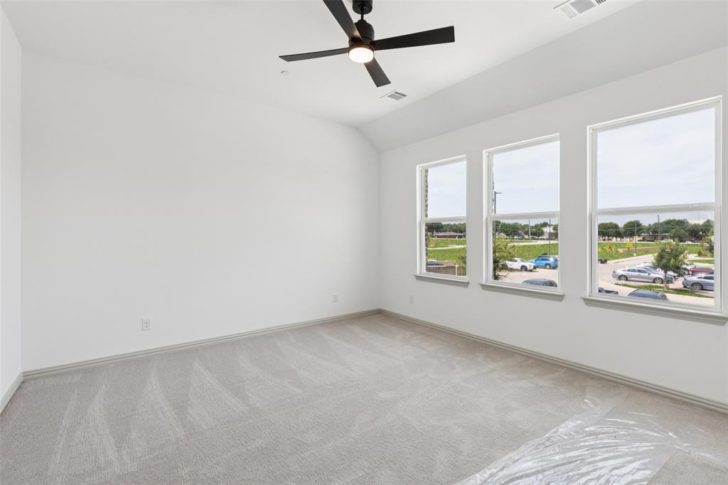 1029 Magdalena Way Midlothian, TX 76065 - Photo 15 of 16 An owner's suite that offers gorgeous finishes, high ceilings, tons of natural light....our Boyd floor plan has it all!