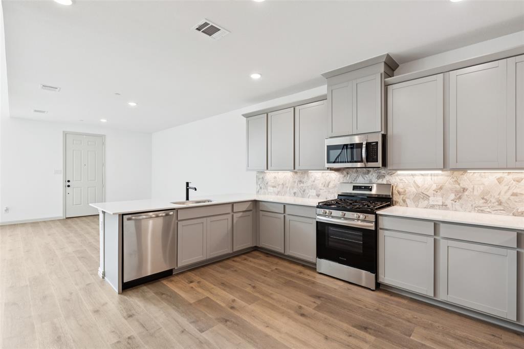 1029 Magdalena Way Midlothian, TX 76065 - Photo 14 of 16 Featuring a great open concept design, entertaining is a breeze in our Boyd floor plan.