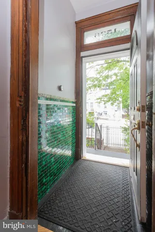 a view of a room with a large window