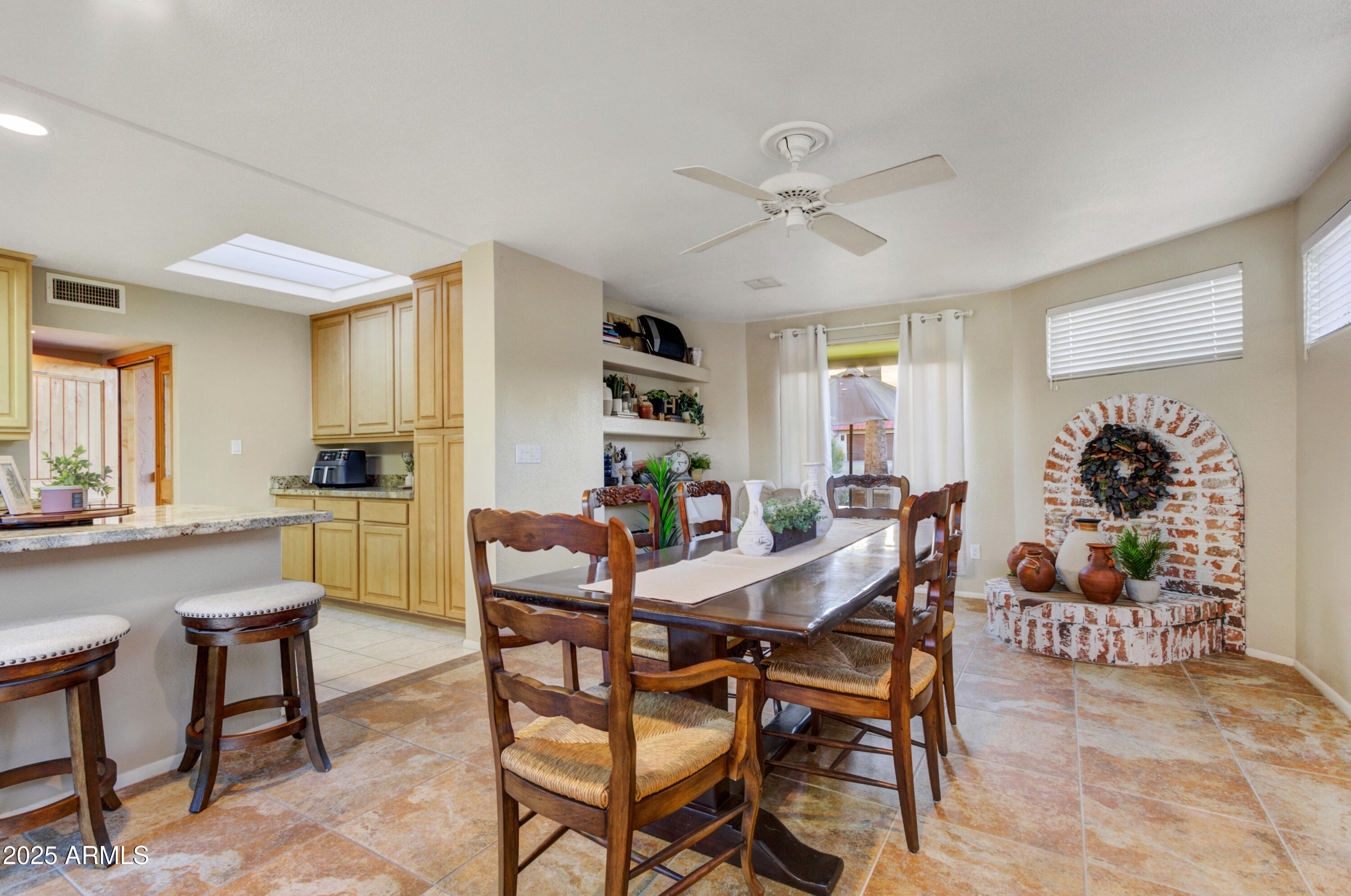 25828 North Primo Circle Rio Verde, AZ 85263 - Photo 6 of 21 a view of a dining room with furniture and a livingroom