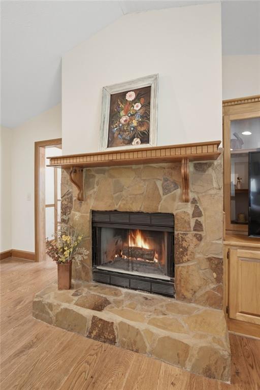 4891 Bill Cheek Road Auburn, GA 30011 - Photo 16 of 99 a living room with a fireplace