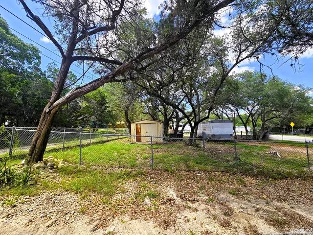 a dining space with furniture and outdoor view