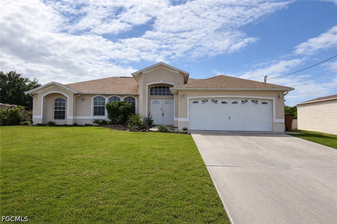 517 Peerless Circle Lehigh Acres, FL 33974 - Photo 2 of 49