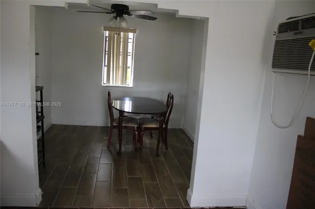 a view of a livingroom with furniture window