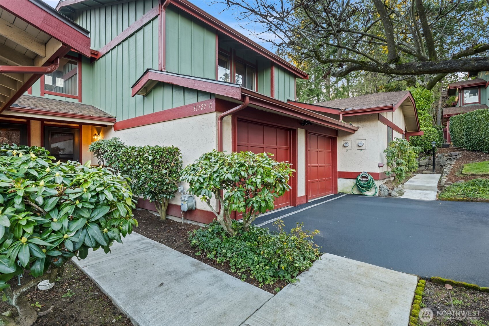 31727 47th Lane Southwest, Unit C Federal Way, WA 98023 - Photo 2 of 39 front view of a house with a street
