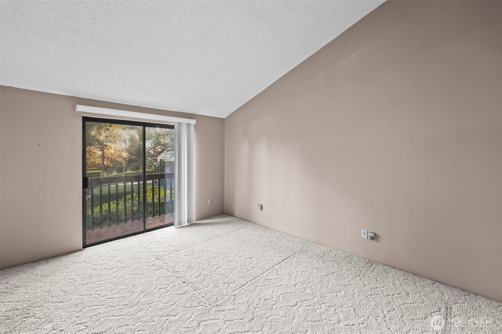 31727 47th Lane Southwest, Unit C Federal Way, WA 98023 - Photo 23 of 39 a view of an empty room with a balcony