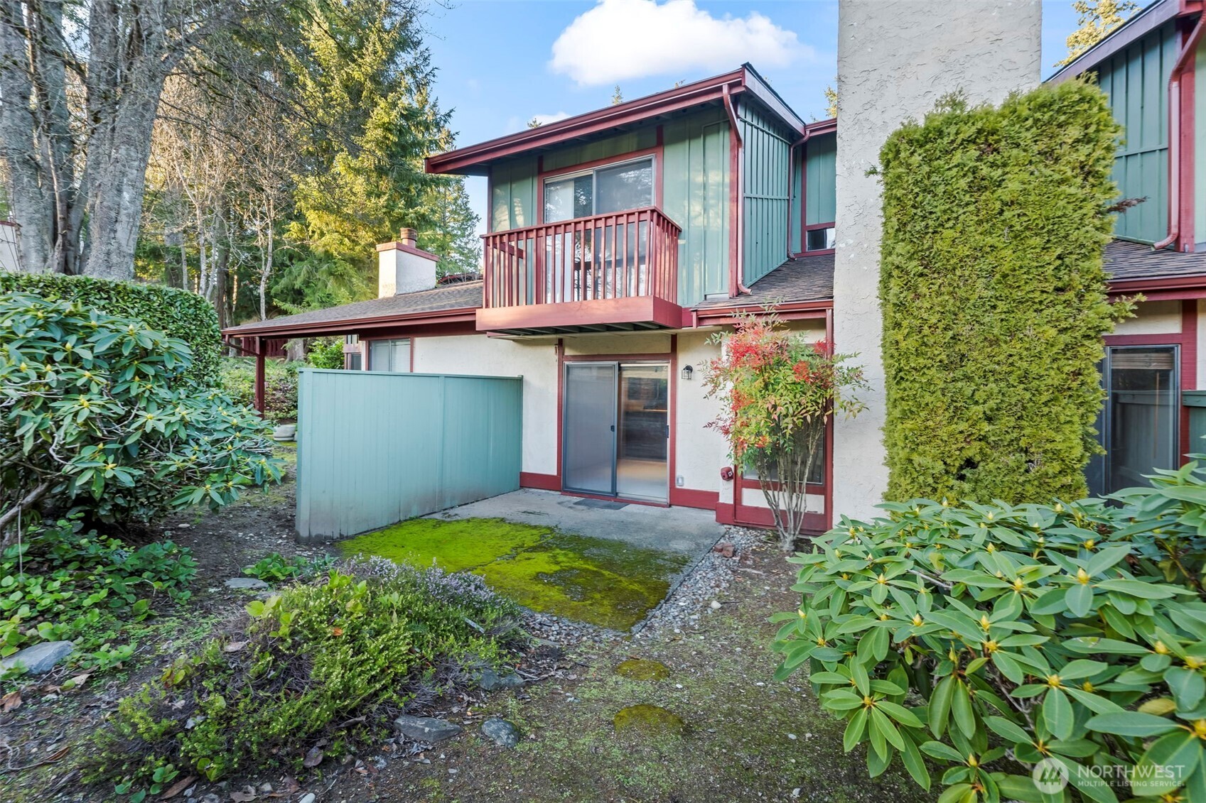 31727 47th Lane Southwest, Unit C Federal Way, WA 98023 - Photo 26 of 39 a view of a house with roof and garden