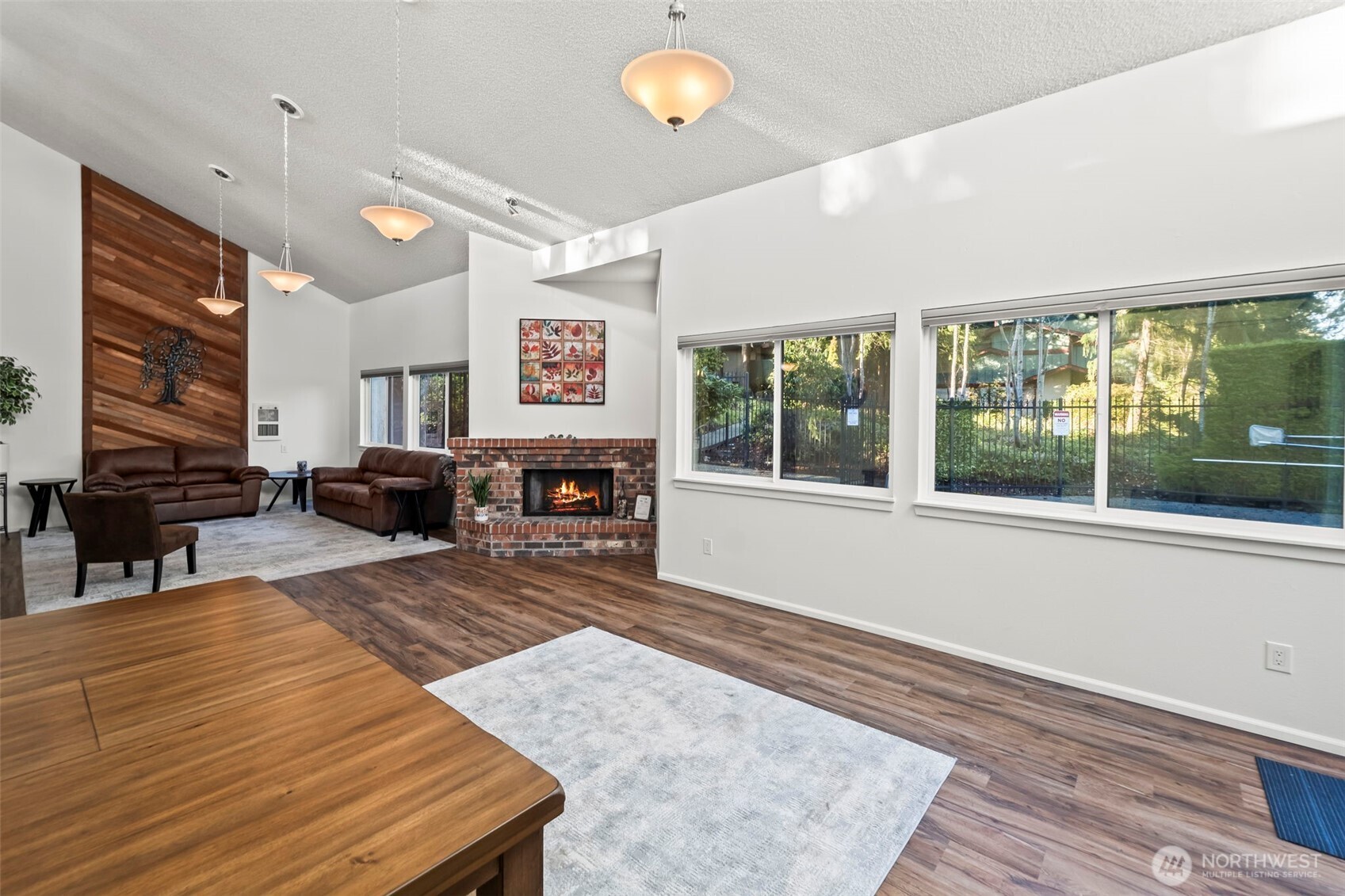 31727 47th Lane Southwest, Unit C Federal Way, WA 98023 - Photo 32 of 39 a living room with furniture large window and wooden floor