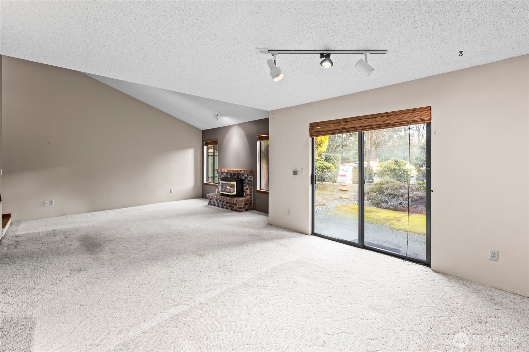 31727 47th Lane Southwest, Unit C Federal Way, WA 98023 - Photo 8 of 39 a view of an empty room with a window