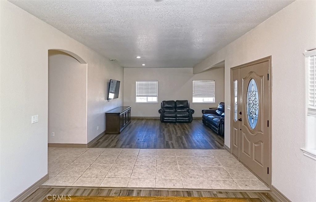 8855 Smith Road Phelan, CA 92371 - Photo 11 of 43 a living room with furniture and a wooden floor