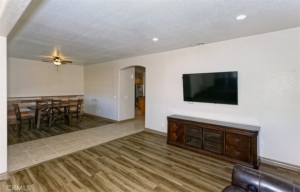 8855 Smith Road Phelan, CA 92371 - Photo 18 of 43 a living room with furniture and a flat screen tv