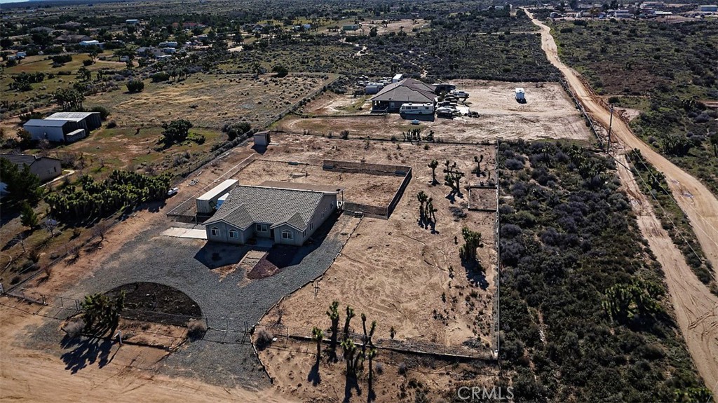 8855 Smith Road Phelan, CA 92371 - Photo 34 of 43 an aerial view of a house with a yard