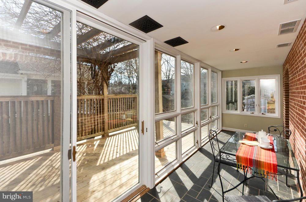 211 West George Mason Road Falls Church, VA 22046 - Photo 9 of 29 Sun room connected to side porch