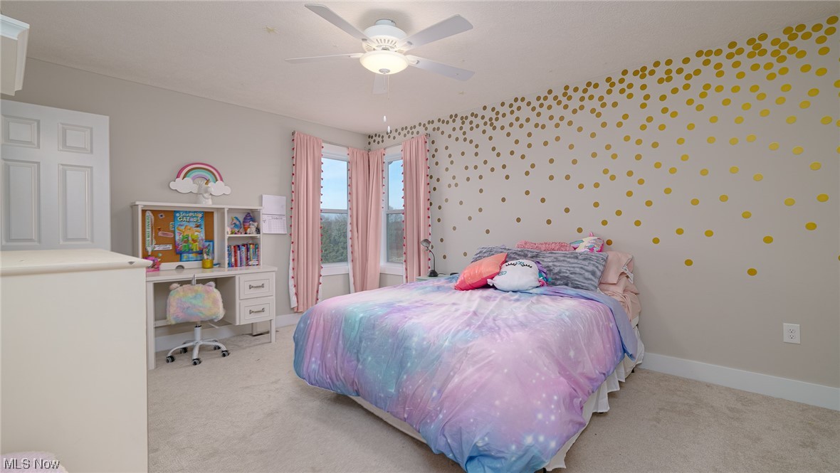 1849 Fixler Road Wadsworth, OH 44281 - Photo 34 of 39 Carpeted bedroom featuring ceiling fan